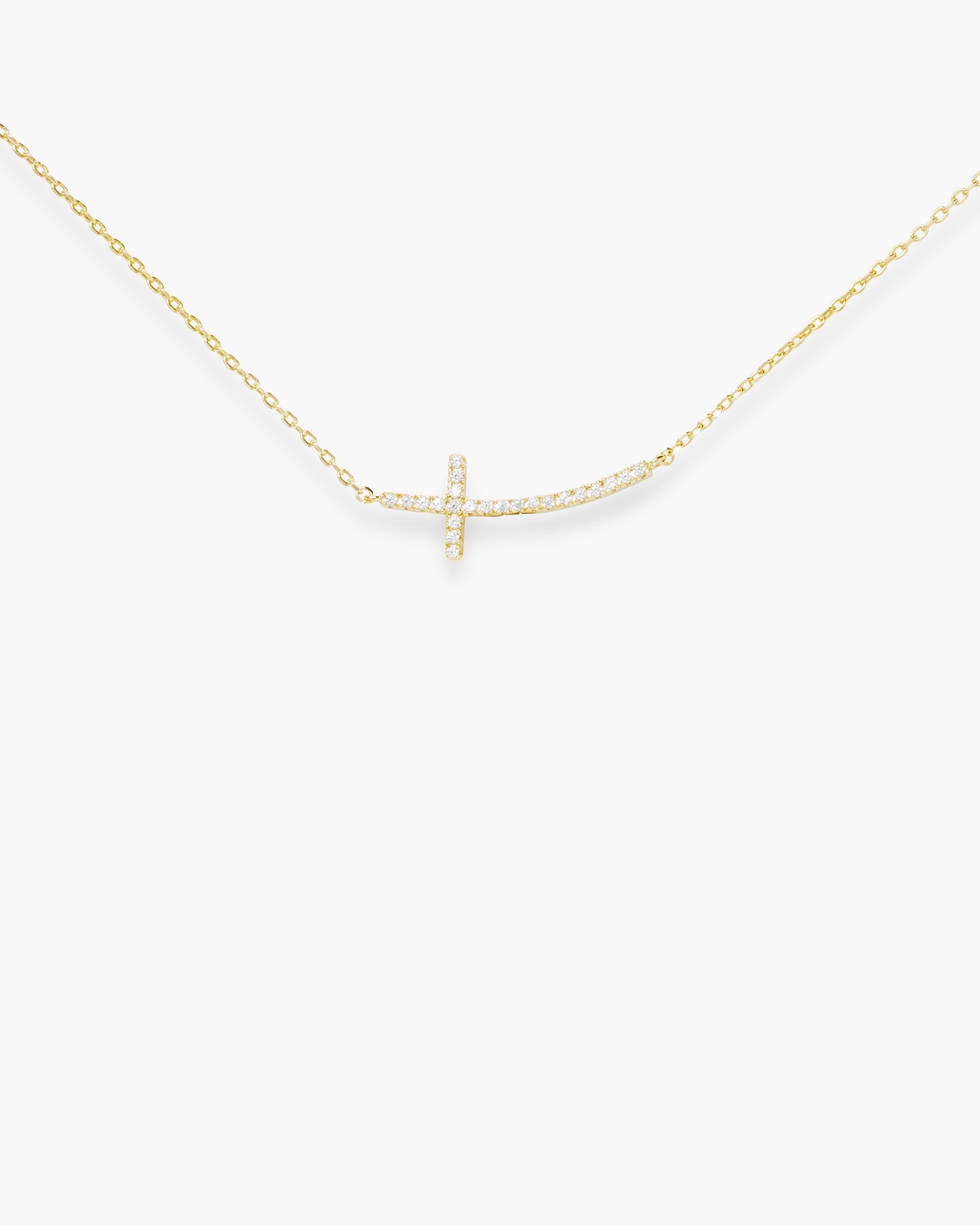 Gold CZ Curved Laying Cross Necklace