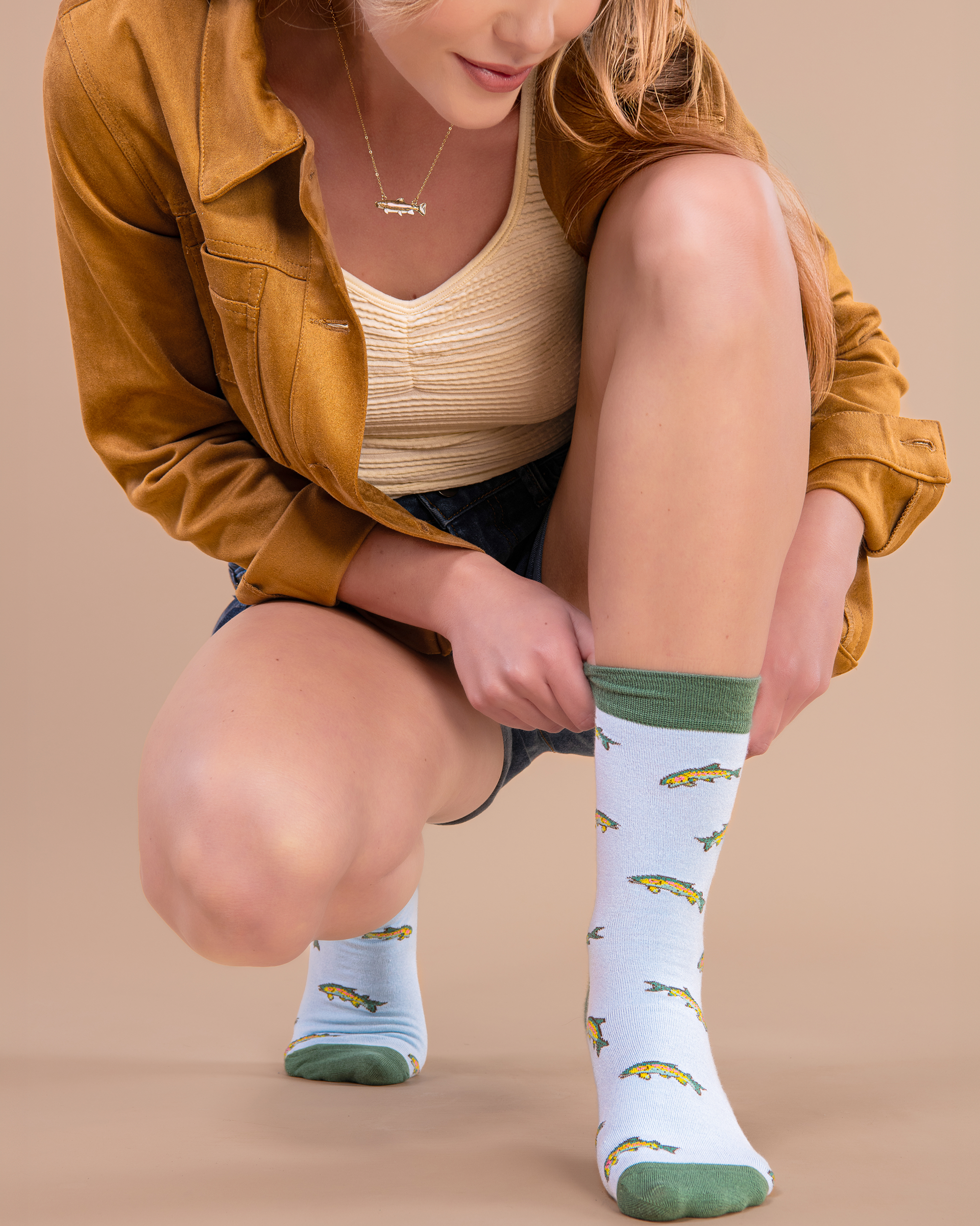 Women in blue socks with fishes